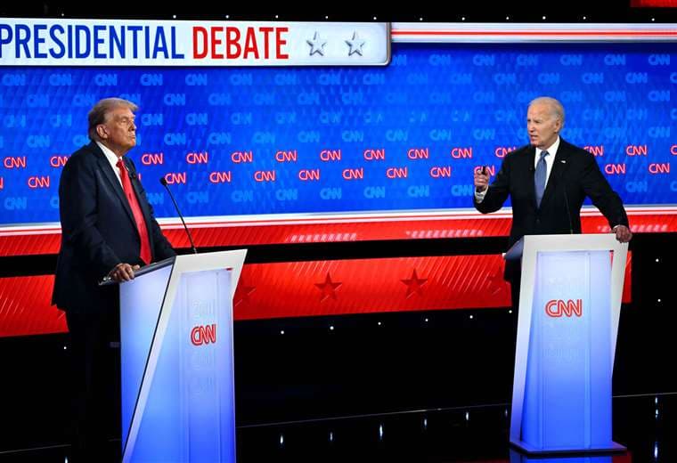 Donald Trump y Joe BIden en el debate presidencial / AFP